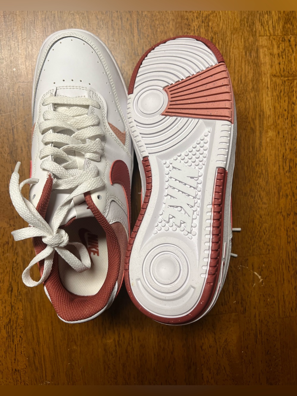 Women’s Nike White and Red Low-Top Sneakers